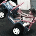 girl_on_toy_car.gif